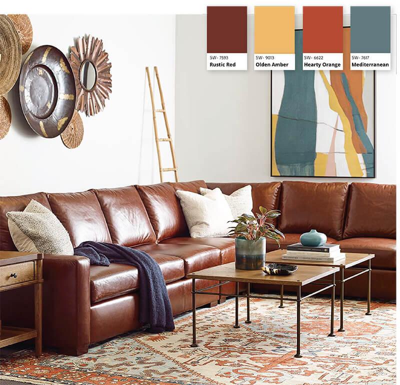 Living room with brown accents and brown leather sofa